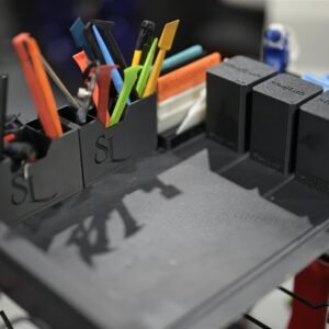 Desktop magnetic organizer holding professional wrap and detailing tools